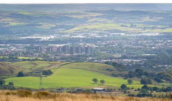 Rochdale town centre viewed from Scout Moor.