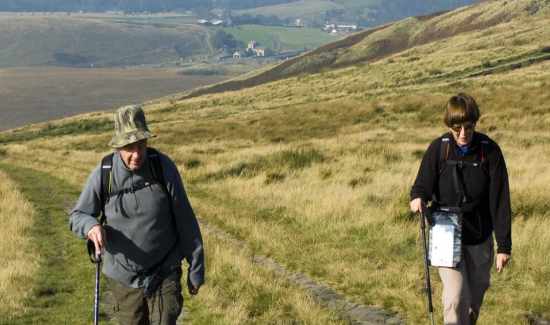 A couple hiking on Scout Moor.