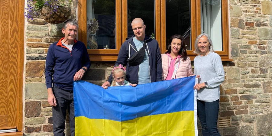 Lee and Angela Wardle with the Ukrainian family they host.