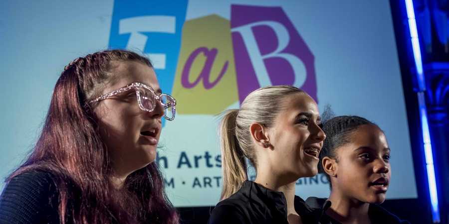 : Singers performing at Rochdale Town Hall.
