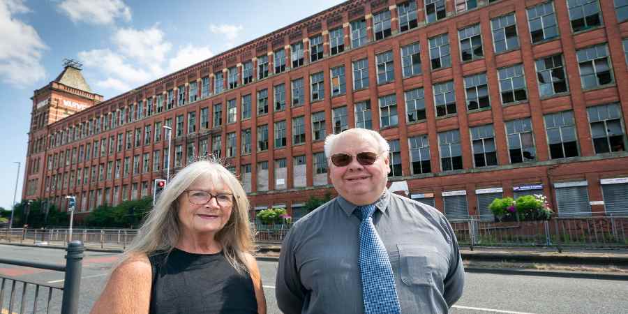 Councillors June West and Neil Emmott outside Warwick Mill.