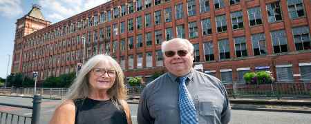 Councillors June West and Neil Emmott outside Warwick Mill.