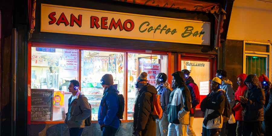 Visitors passing the San Remo.
