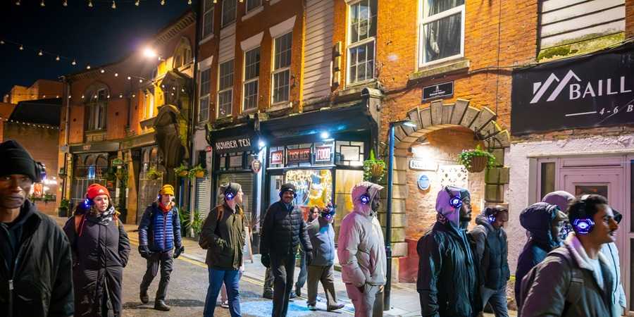 Visitors to the event walking down Baillie Street.