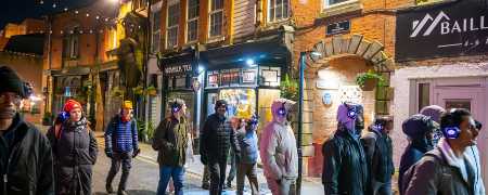 Visitors walking down Baillie Street.