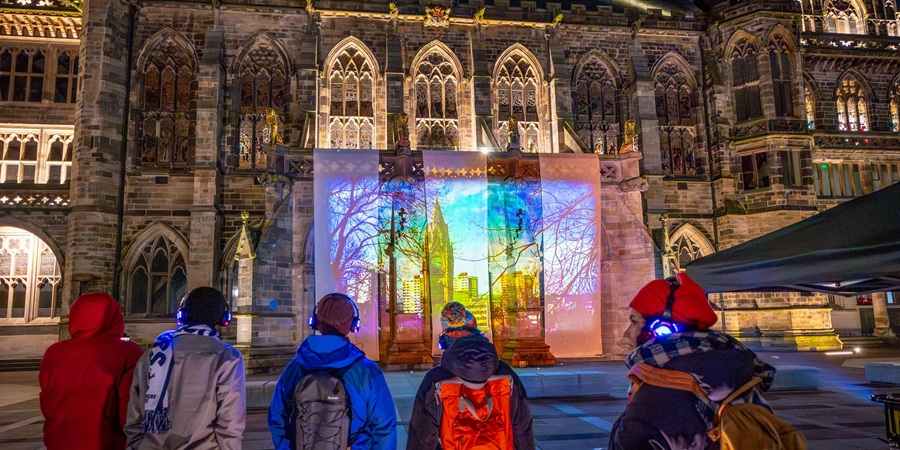 Visitors viewing art installation.