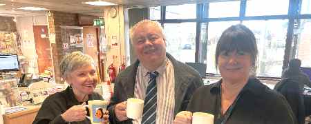 Councillor Neil Emmott with council staff.