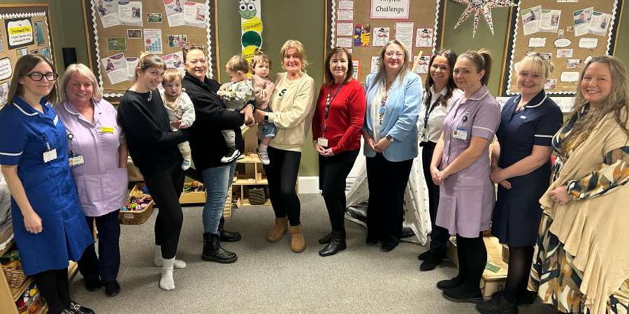 Families with babies, joined by Councillor Rachel Massey.