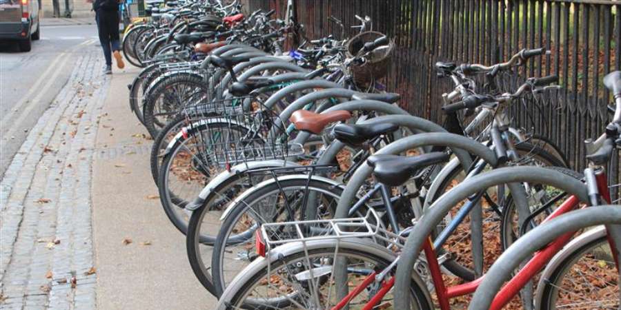 A row of parked bicycles.