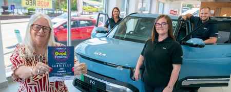 Councillor Sue Smith with Premier Kia team members.