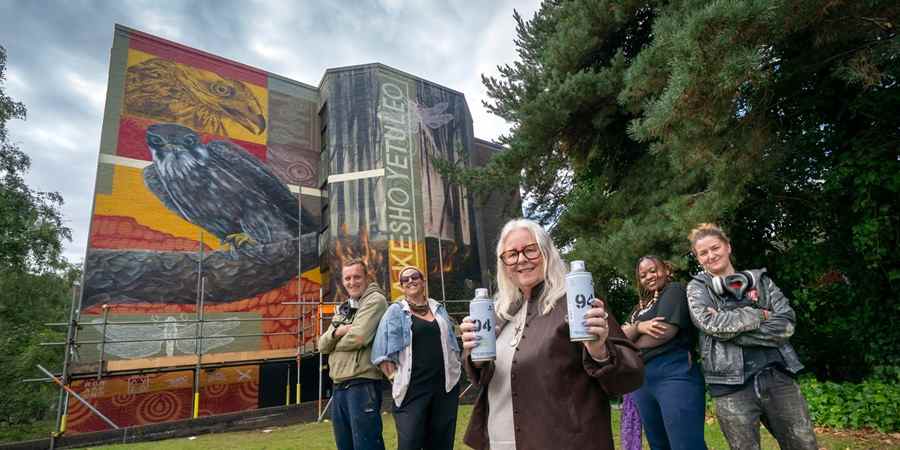 Councillor Sue Smith and artists.