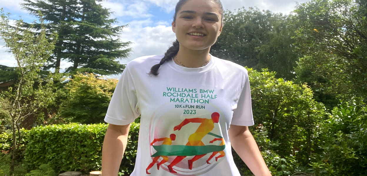 The 2023 Half Marathon T-shirt being modelled.