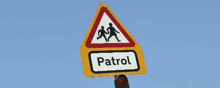 School crossing patrol sign.