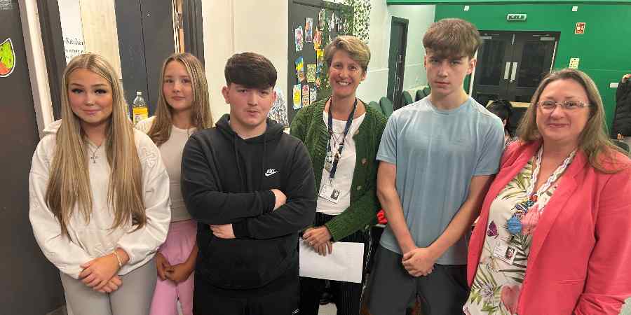 Councillor Rachel Massey with young people and youth centre staff.