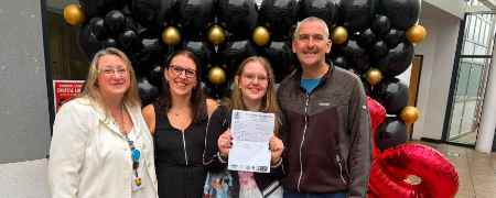 Councillor Rachel Massey with Heidi and her parents.