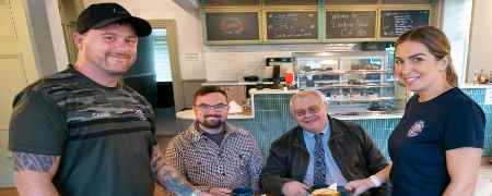 Councillors Danny Meredith and Neil Emmott with council staff.
