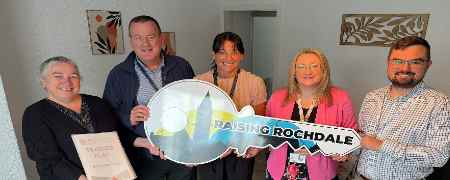 Councillor Daniel Meredith and Councillor Rachel Massey with childrens services staff.