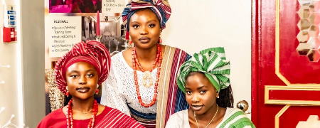 Women wearing traditional African clothing.