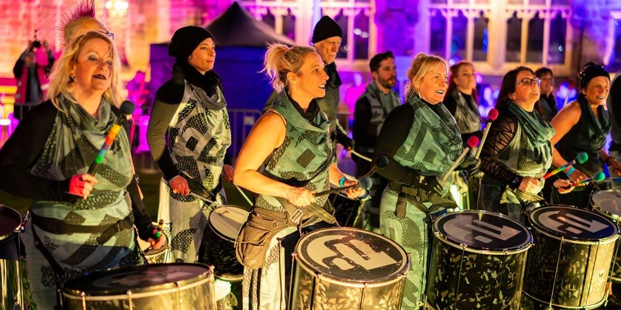 A drumming group.