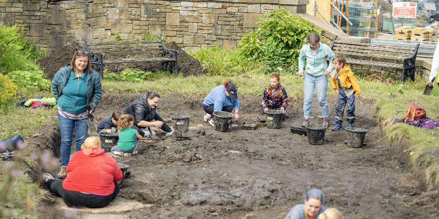 A family at a digsite.