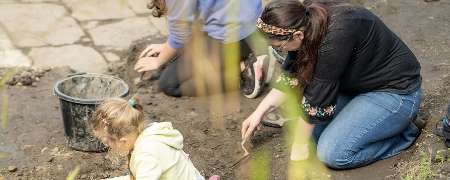 Families taking part in the Big Dig.