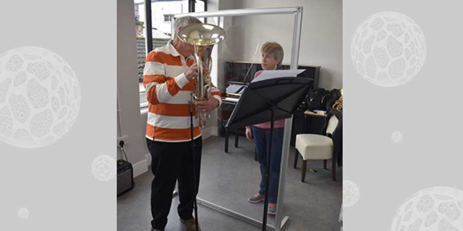 Student in a brass instrument lesson.
