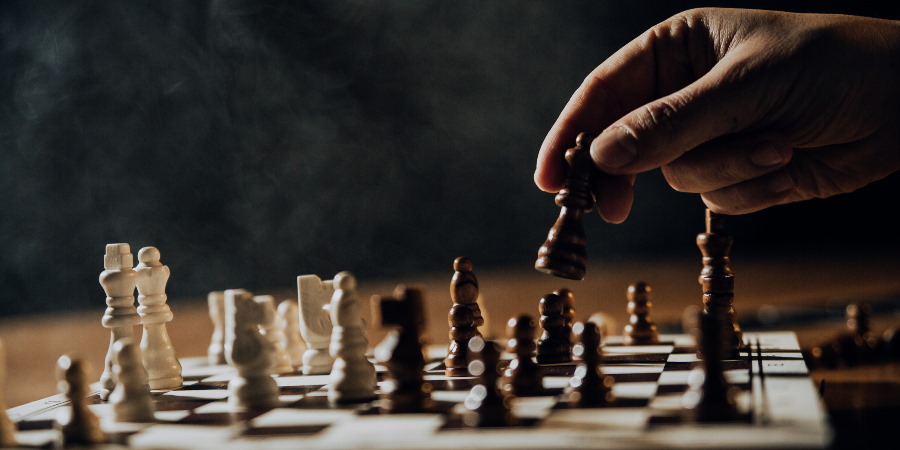 A chessboard with one player making a move.