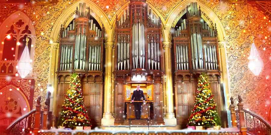 Jonathan Scott in front of the town hall organ.