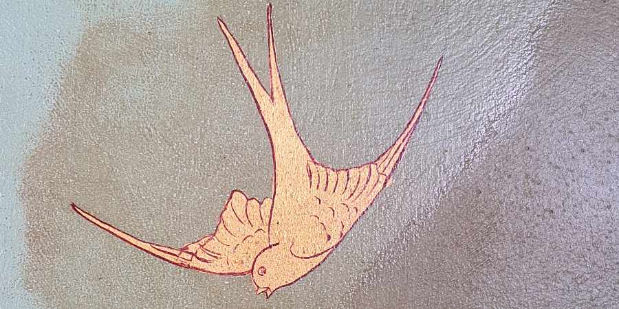 Details of a bird wall decoration.