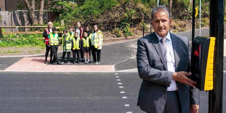 Councillor Shah Wazir at the new crossing.