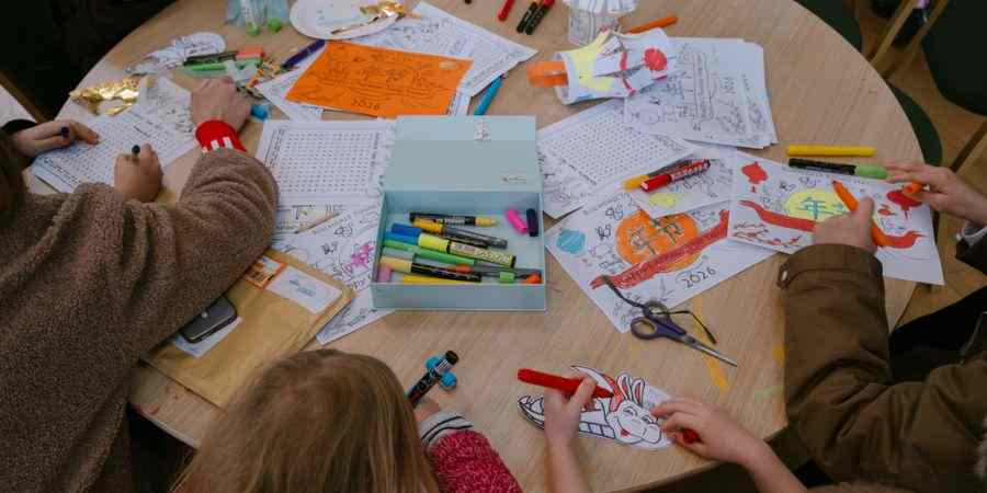 Children at a painting table.