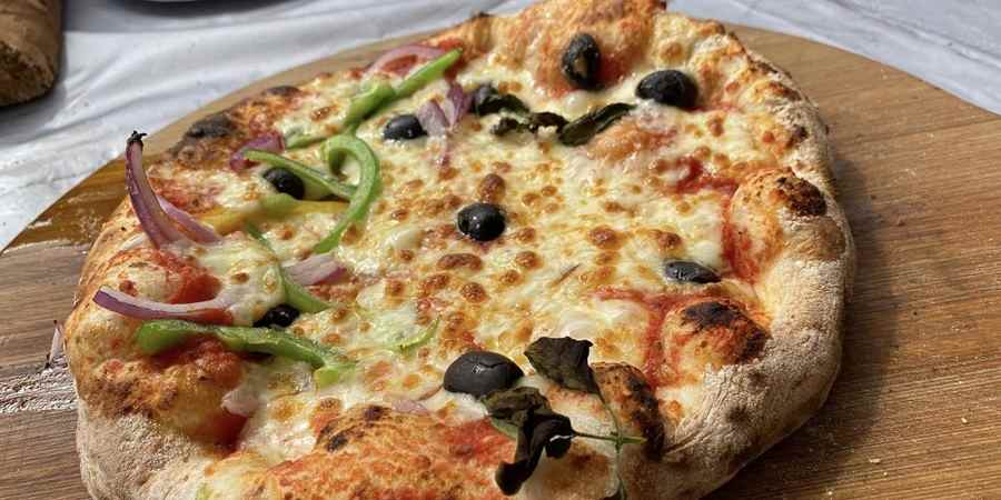 A cooked pizza.