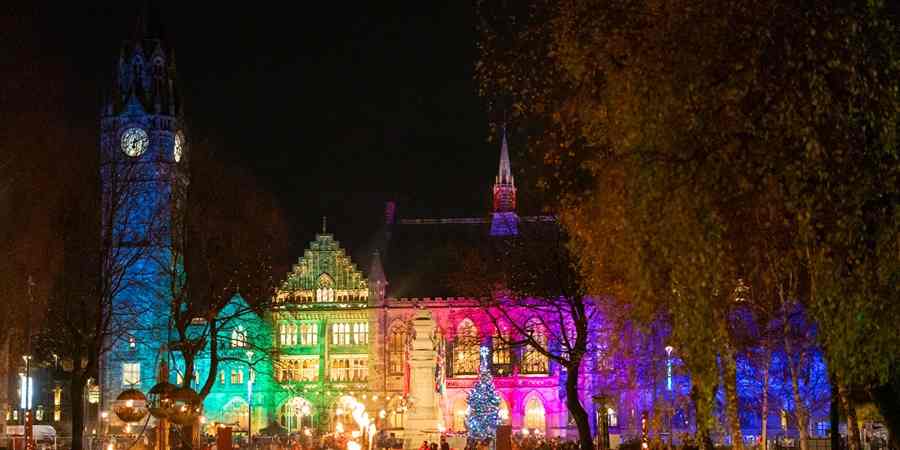 Rochdale Town Hall lit up at night.