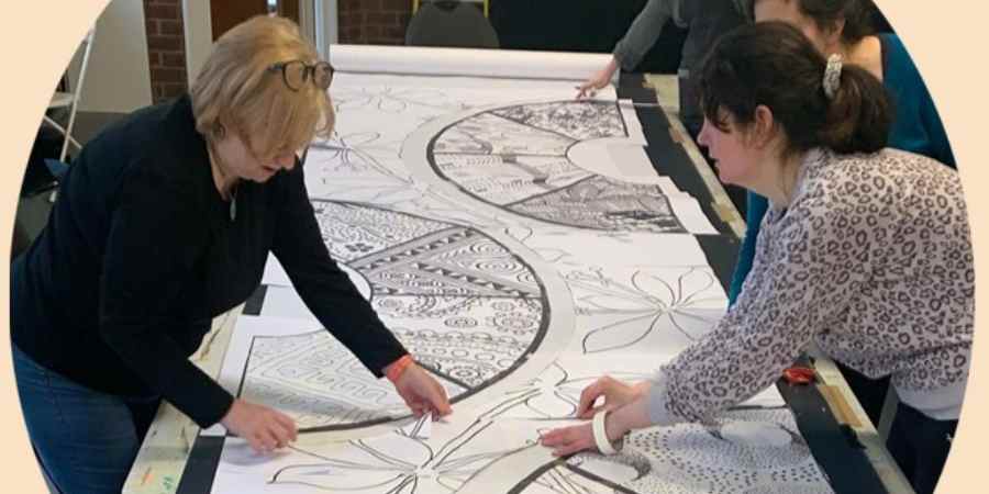 People working on a flag design.