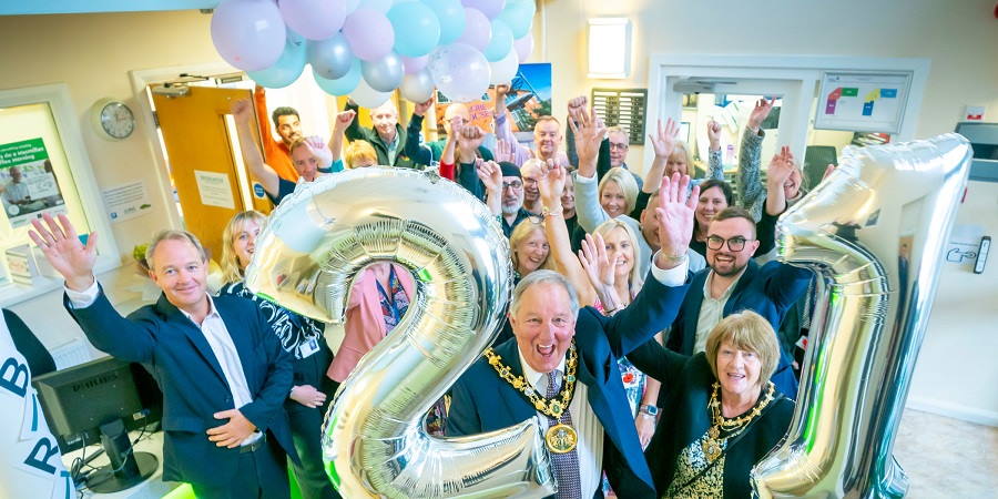 Mayor, Councillor Mike Holly, Councillor Daniel Meredith and guests at Globe House.