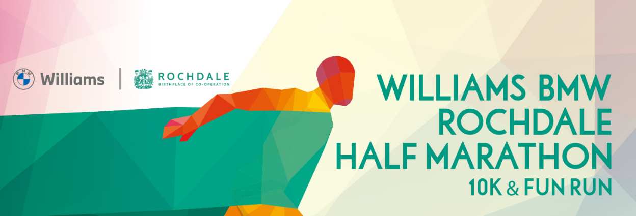 Half Marathon banner, illustrated figure running through finishing tape, text reading Williams BMW Rochdale Half Marathon, 10K and Fun Run.