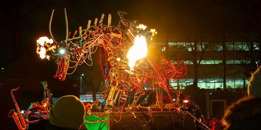 A large, intricate metal sculpture of a dragon.