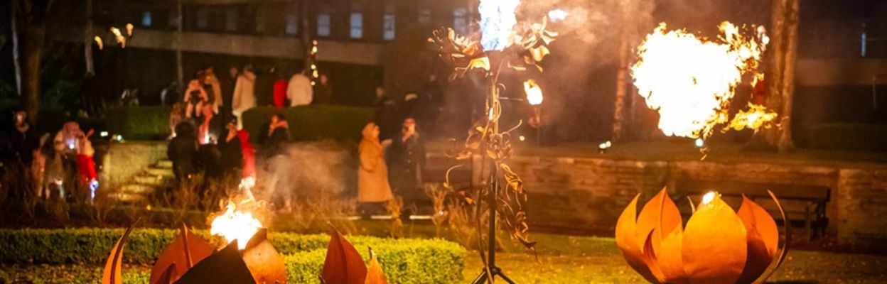 Sculptures shooting out flames.