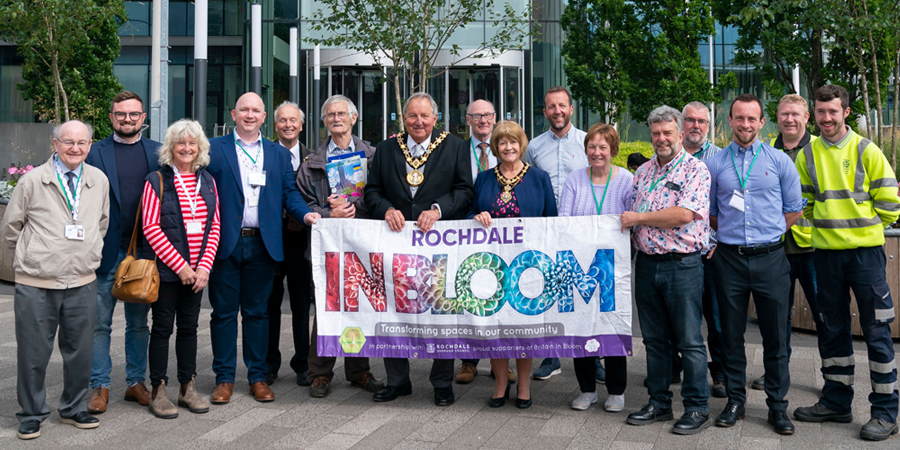 Mayor and mayoress of Rochdale with councillors and members of Environmental team in front of Number One Rochdale.
