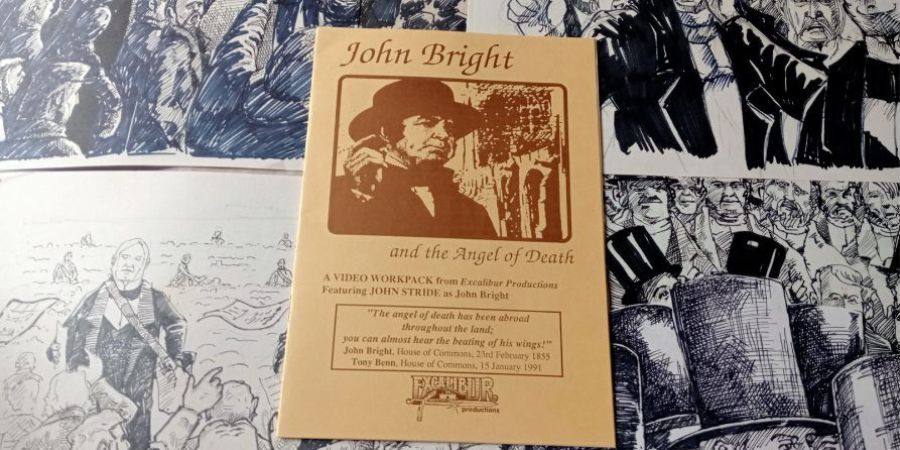 A book with a picture of a person in a suit and hat on it.