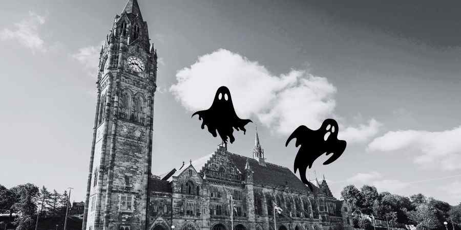 Cartoon ghosts above Rochdale Town Hall.