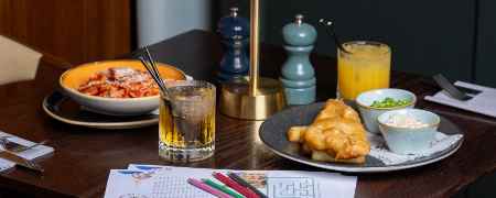Children's meals alongside colouring books.