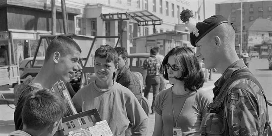 Soldiers and civilians in Kosova.