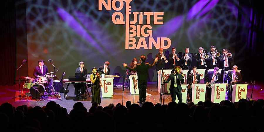 Not Quite Big Band in performance.