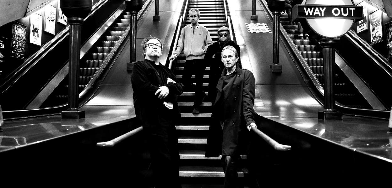 Ocean Colour Scene pictures on an escalator.