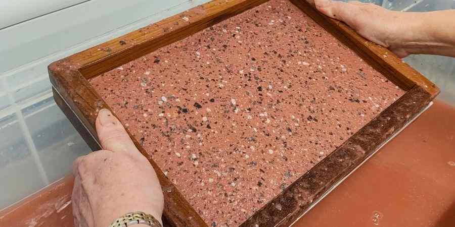 Close up of papermaking process.