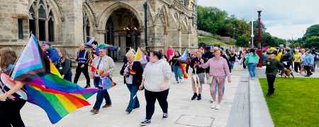 Pride Parade passing Rochdale Town Hall.