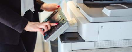 A photocopier being used.