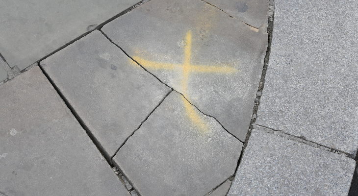 A cracked pavement.