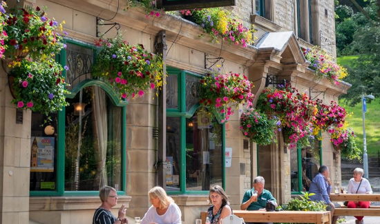 Diners outside the Flying Horse Hotel.